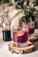 pink elderberry mocktail in a glass