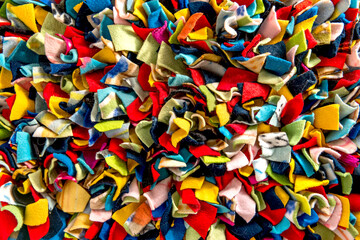 Fototapeta na wymiar Background of colored cloths. Top view