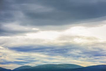 Beautiful landscape with mountain range and sky.