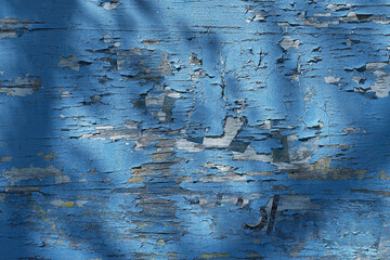 Abstract vintage background, old blue paint peeling off a wooden wall. Image for adding text message or layout for design work