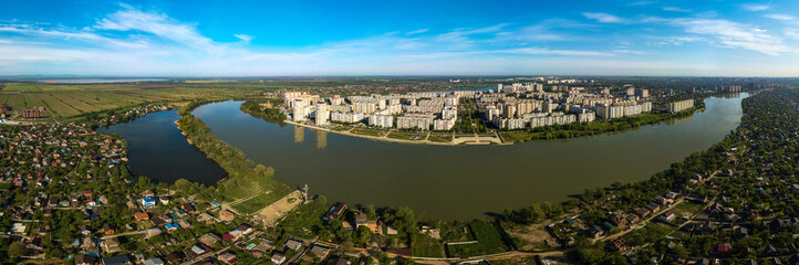 Fototapeta na wymiar river Kuban and lake Brzhegokai near the city of Krasnodar in southern Russia on a sunny May morning - aerial very large panorama view. 