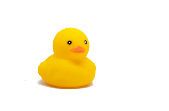 Cute Yellow colored plastic duck toy isolated on white background