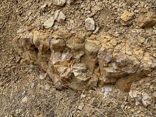 Crumbling rock wall, Badlands texture