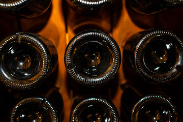 rows of wine's bottles bottom 