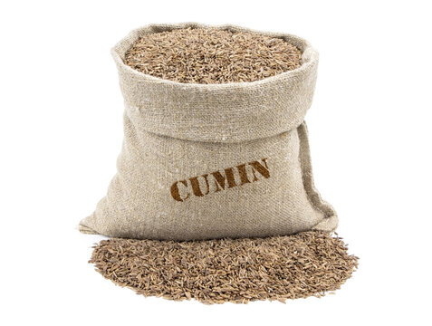 Seeds of cumin in a sack isolated on a white background. Caraway seeds. Caraway in a burlap sack. Healthy food. Guianensis caraway fruit in a jute bag. Thyme.Vegan food