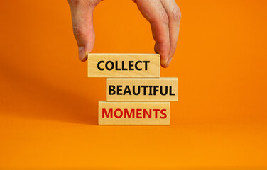 Collect beautiful moments symbol. Wooden blocks with words 'Collect beautiful moments'. Beautiful orange background, businessman hand. Business, collect beautiful moments concept, copy space.