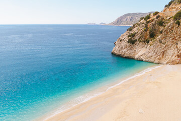 Kaputas beach. People enjoying sun and sea at the beautiful turquoise sea and sandy beach in Turkey