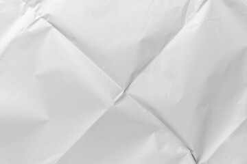 Crumpled wrinkled folded white paper