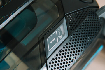 Fototapeta premium Technologies that facilitate wet cleaning. Modern home appliances. Water supply button. Top view
