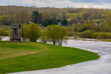The windmill at the river bank