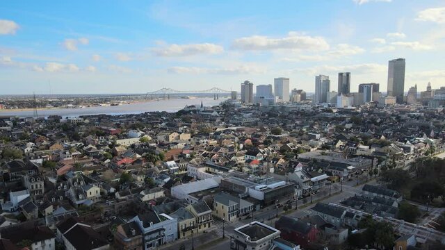 French Quarter New Orleans South USA Flyover Aerial of Houses Downtown in Background