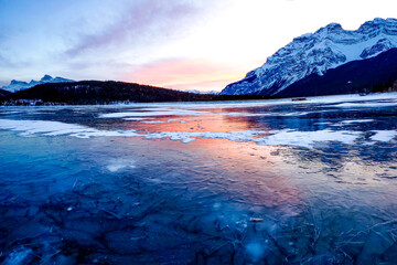 Frozen Lake With Sunset Reflection
