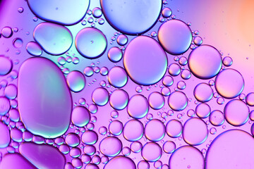Colorful artistic of oil drop floating on the water. Abstract bubble background.
