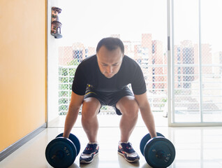Man Exercising At Home