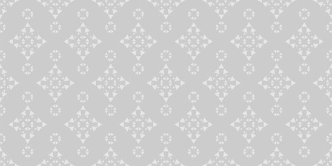 Simple background pattern with geometric ornament on a gray background, wallpaper. Seamless pattern, texture. Vector graphics