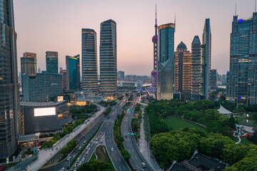 Sunset view of Lujiazui, the financial district in Shanghai, China, aerial shot.