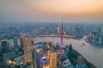 Sunset view of Lujiazui, the financial district in Shanghai, China, aerial shot.