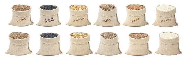 Set of spices in sacks isolated on a white backrgound.Sesame and black sesame. Cumin and dill. Flax...