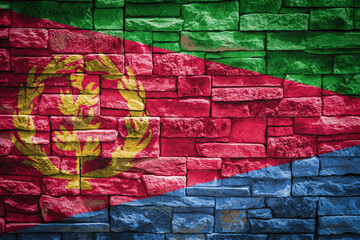 National flag of Eritrea on stone  wall background.The concept of national pride and symbol of the country. Flag  banner on  stone texture background.