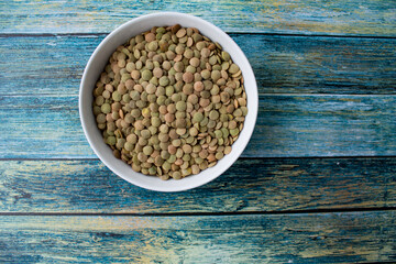 cereals in white plates, on a turquoise table, food