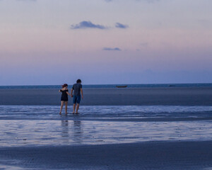couple walking on the beach