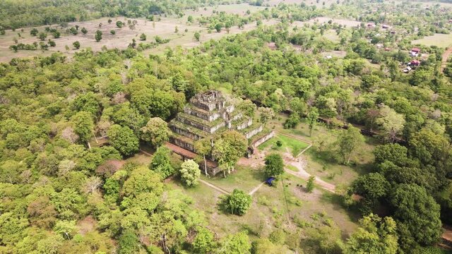 Angkor temple Aerial, Prang - The Koh Ker pyramid temple, nested in the mystic Cambodian jungle, drone rotation 4k footage