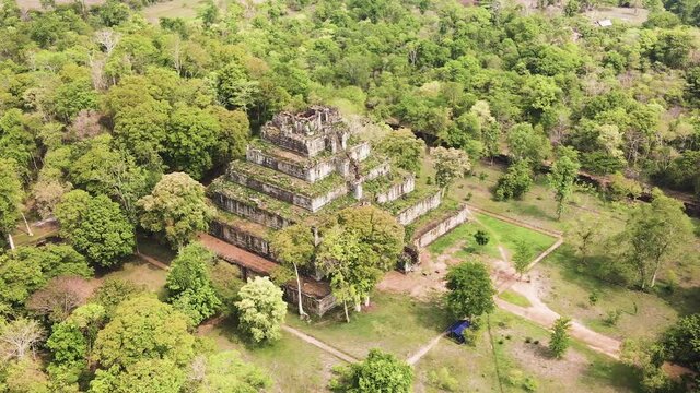 Angkor temple Aerial, Prang - The Koh Ker pyramid temple, nested in the mystic Cambodian jungle, drone rotation footage HD crop