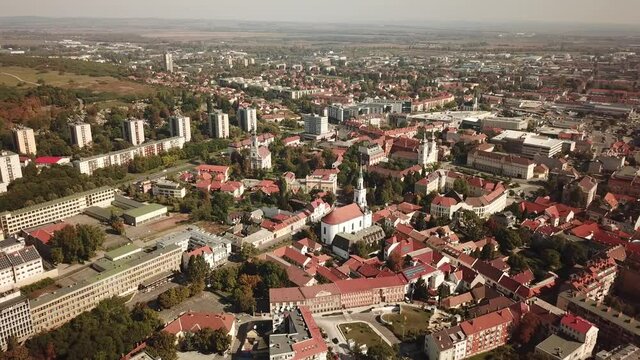 Cinematic aerial drone dolly shot of downtown Miskolc, fourth largest city and a major industrial hub, Northern regional center of Hungary, capital of Borsod-Aba&uacute;j-Zempl&eacute;n county