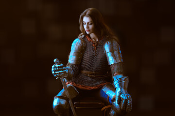 female knight with a sword - obrazy, fototapety, plakaty