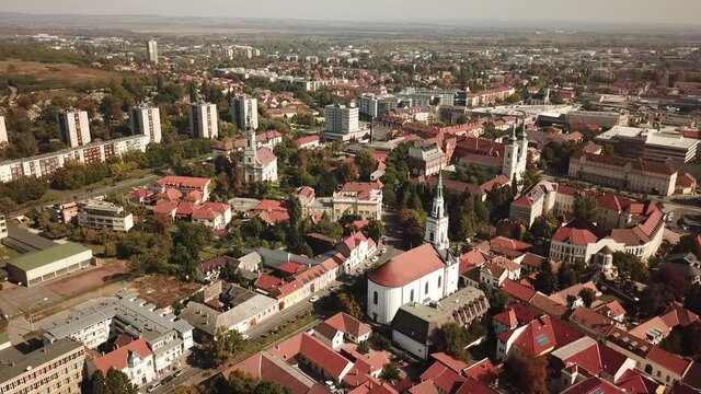 Cinematic dolly aerial drone footage of the city of Miskolc, fourth largest city and a major industrial hub, Northern regional center of Hungary, capital of Borsod-Abaúj-Zemplén county
