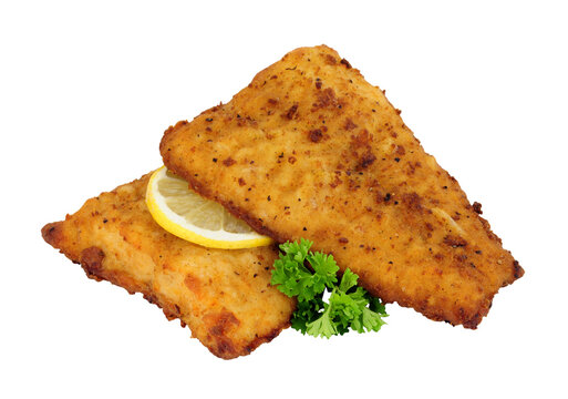 Fried battered haddock fish fillets isolated on a white background