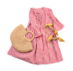 Stylish female clothes with accessories on white background