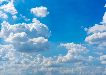 Beautiful cloudscape of cumulus white clouds on blue sky