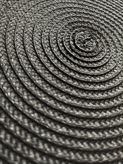 Naklejka premium Abstract backdrop grey colour. Backdrop. Circular wicker texture. 