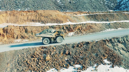Loaded truck on the road of a copper mining site