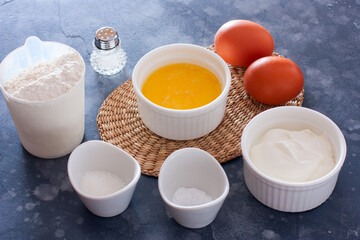 ingredients for unleavened dough - flour, eggs, butter, soda, horizontal