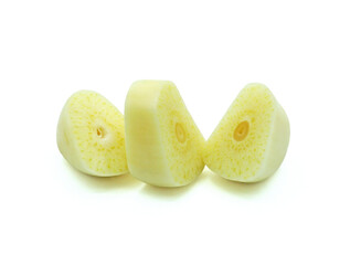 Fresh peeled garlic clove sliced or Allium sativum, Cut in pieces, Spices ingredient for cooking, Isolated on white background