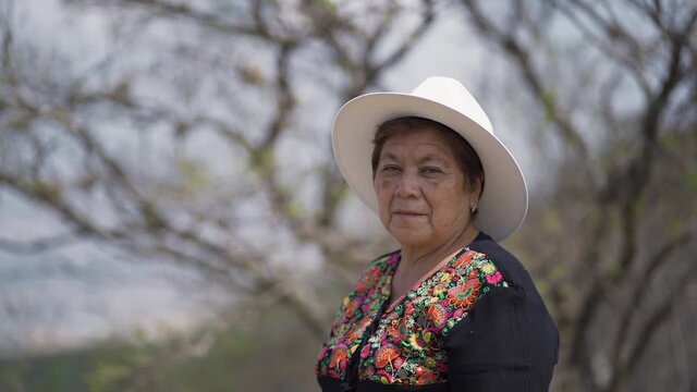Mexican mother looking at the camera