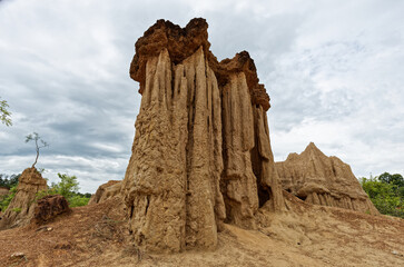 A close up of a rock formation structure monument in Sao Din Na Noi, Nan Thailand