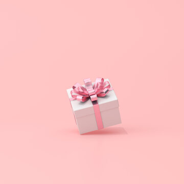 3D rendering of gift box on pink background.