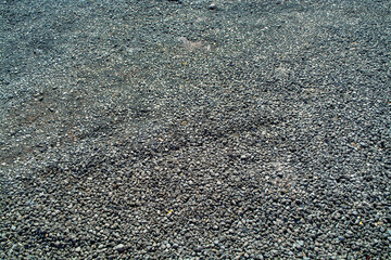 Gravel and stones on the road, texture and background for design, used for 3d models