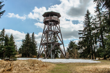 Wooden observation tower called Anna on Anensky Peak in Orlicke Mountains,Czech Republic.Spiral staircase of lookout tower, construction with metal steps and oak platform.Czech tourist place.