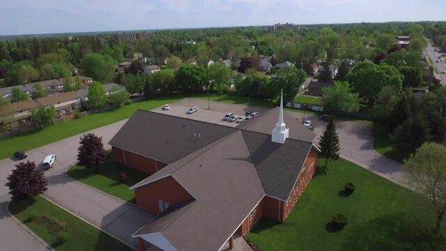 Aerial shot of church building and parking lot
