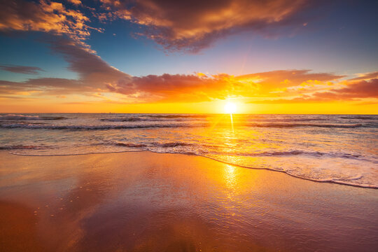 Beach sunrise over the tropical sea © ValentinValkov