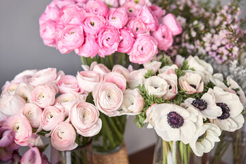 Set of white, pink and magenta flowers for Interior decorations. The work of the florist at a flower shop. Fresh cut flower.