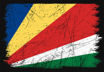 Creative grunge flag of Seychelles country. Happy independence day of Seychelles. Brush flag on shiny black background