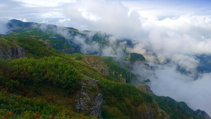 Mountain landscape after rain. cloudy scene in Ceahlau, Romania