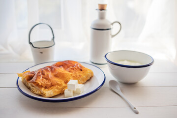 Baked cheese pie with milk. Bulgarian butter banitsa for breakfast