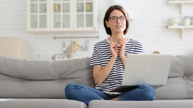 Pensive woman concentrated think on solution of business issue working remotely from home come up with great idea. Female journalist or writer get inspiration start typing response to email on laptop