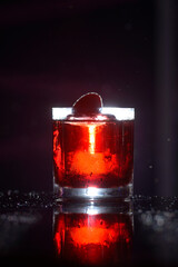 glass of cold fresh summer strawberry coctail on a table